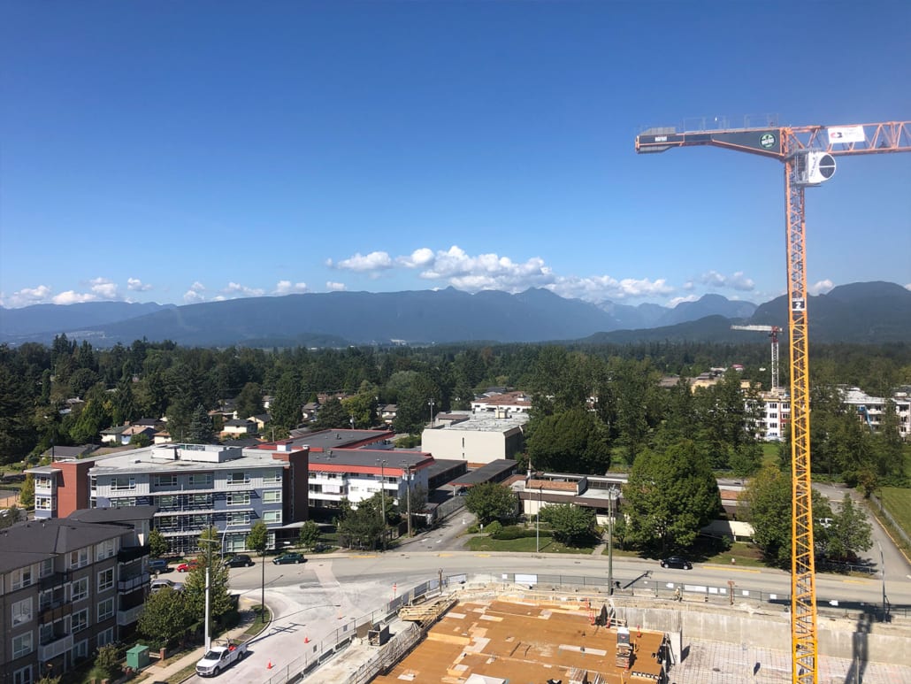 Landscape view of the job site with Bigfoot crane