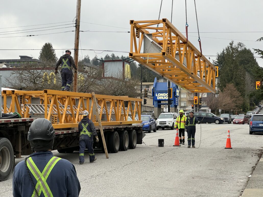 Bigfoot Crane Company service technicians performing maintenance on a crane.